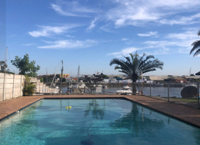 Swimming pool and social areas at Bluff Yacht Club